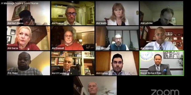 Aurora City Officials Brought to Tears During Meeting As Mayor Recites ICU Nurse's Plea