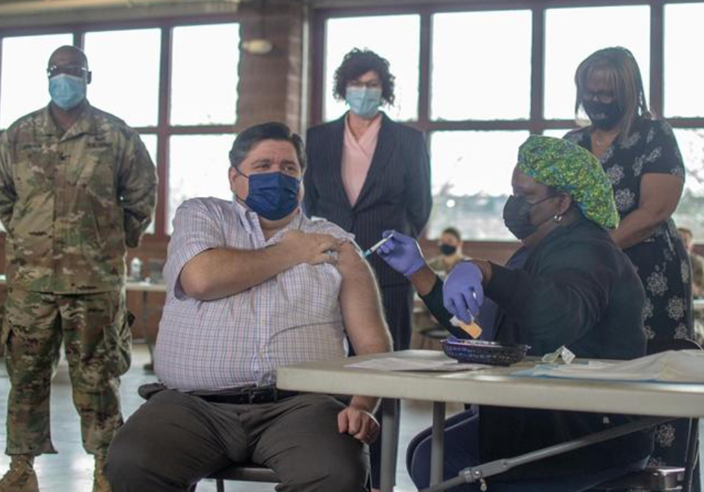 Pritzker Vaccinated as Positivity Rate Rises