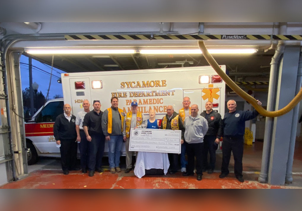 The Sycamore Lion's Club Presents A Donation Check To The Sycamore Fire Department For $2,160